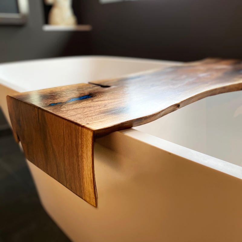 Black walnut infinity edge bath tray. bath caddy. blue epoxy filled. with wine glass holder. Lightwood Designs, custom woodworking, home décor, office décor, gift, wedding gift, anniversary gift, custom engraving, Elora, Ontario, Handmade, Local