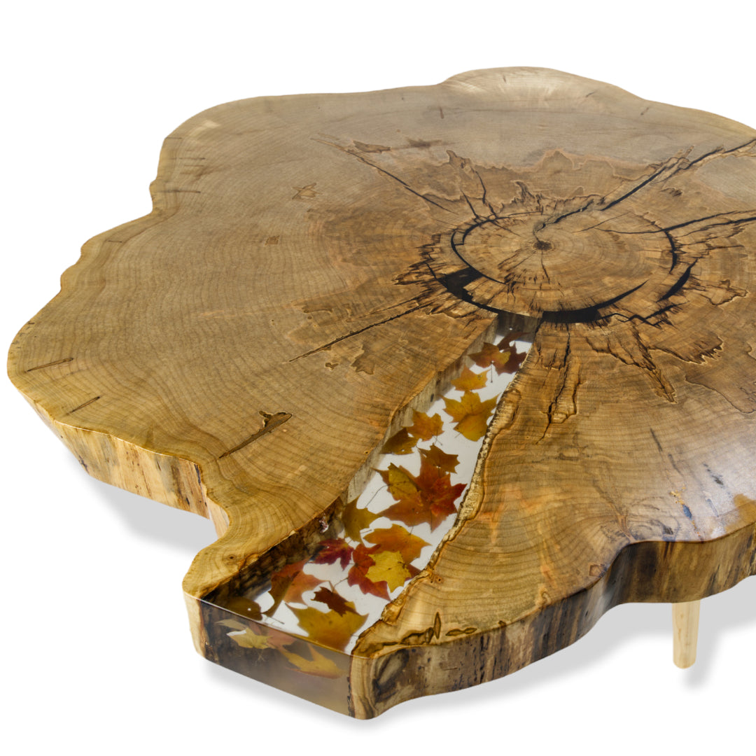 Silver Maple live edge cross section coffee table with maple leave cast in epoxy. Lightwood Designs. Lightwood Designs, custom woodworking, home décor, office décor, gift, wedding gift, anniversary gift, custom engraving, Elora, Ontario, Handmade, Local